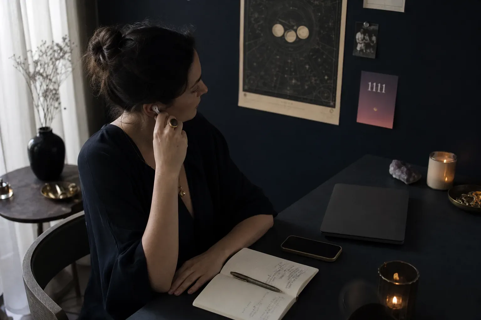 Woman listening quietly before opening her laptop