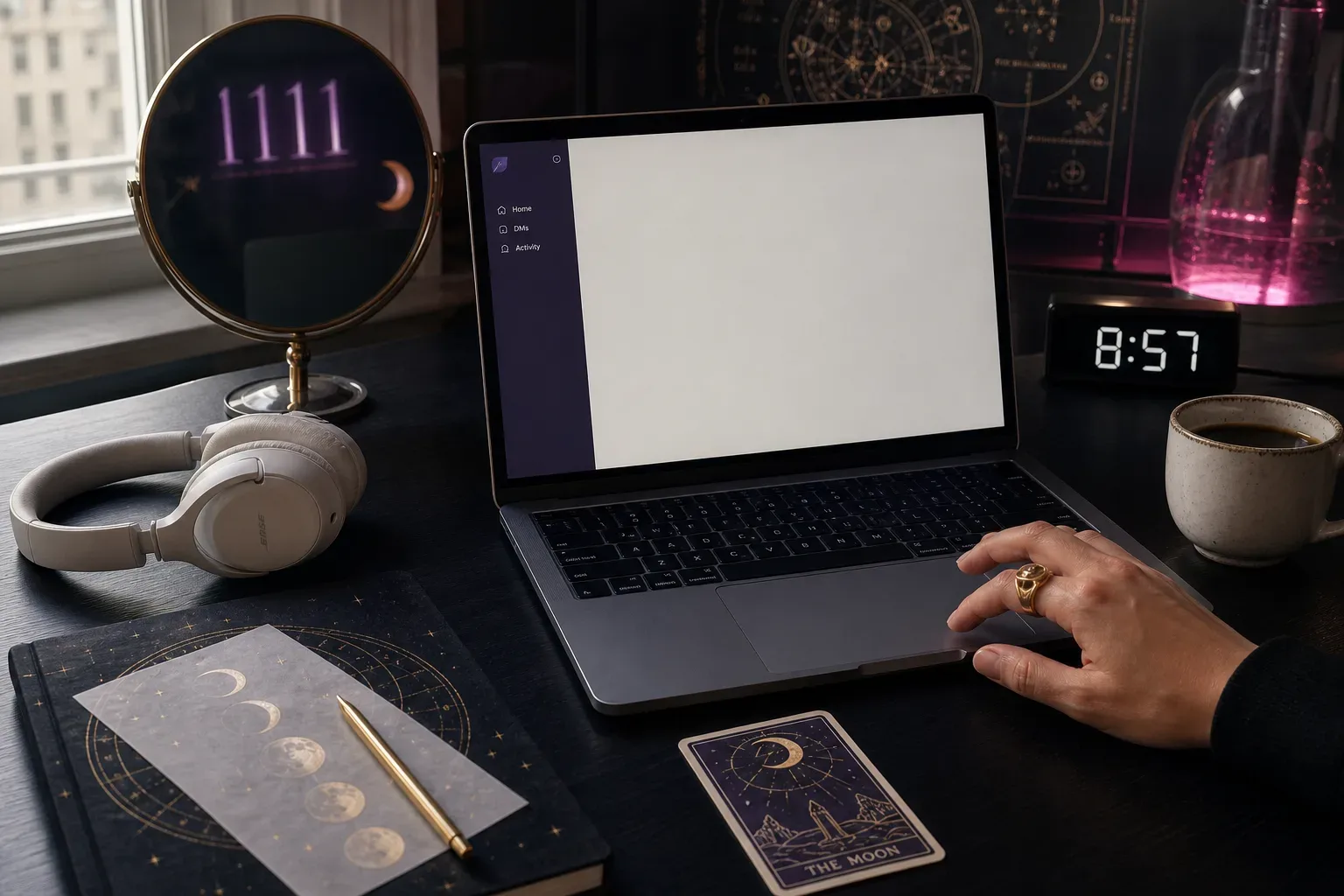Desk with headphones beside unopened Slack screen